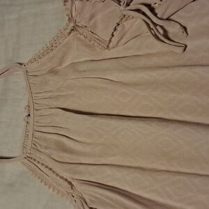 Adorable blush colored flowy top from exhilaration